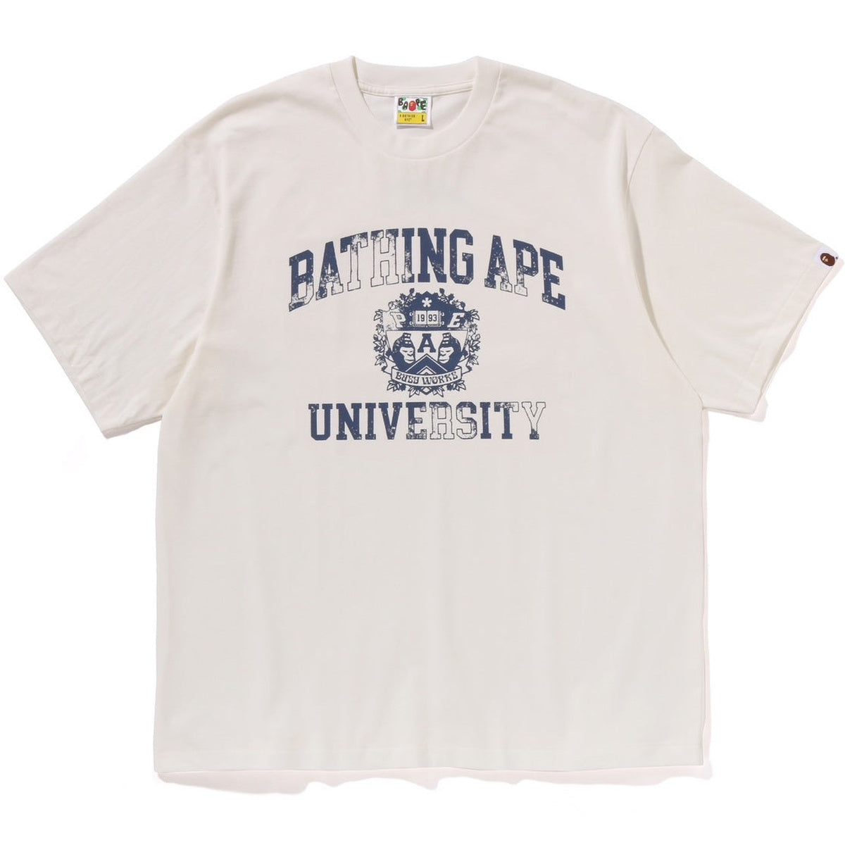 A BATHING APE BAPE SPRAY PRINT COLLEGE LOGO RELAXED FIT TEE IVORY
