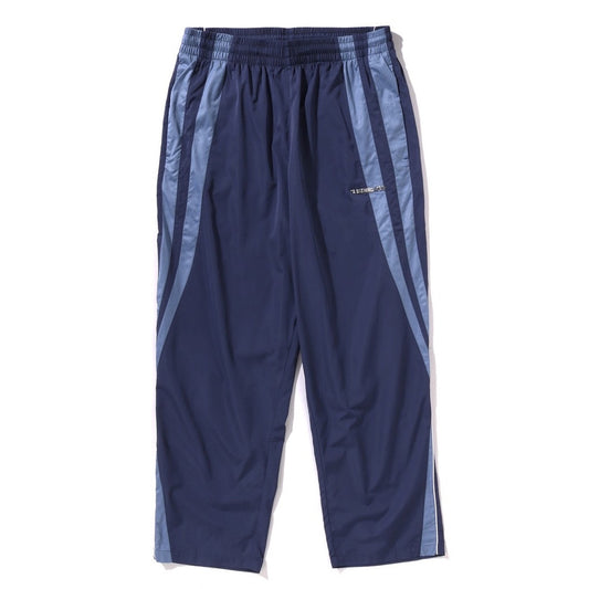 A BATHING APE BAPE LINE CAMO METAL LOGO RELAXED FIT TRACK PANTS NAVY