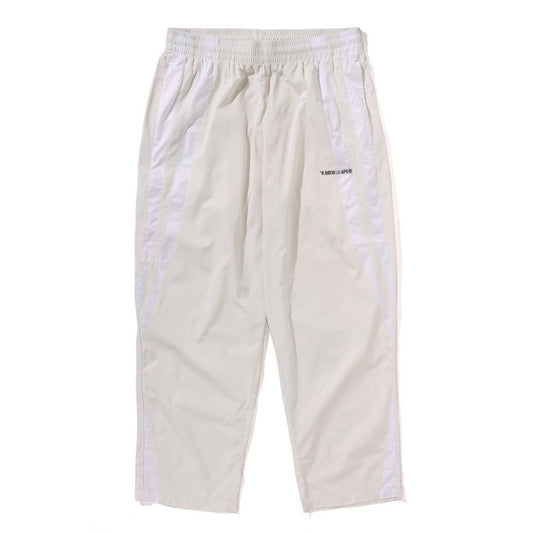 A BATHING APE BAPE LINE CAMO METAL LOGO RELAXED FIT TRACK PANTS IVORY